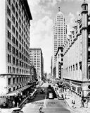 Looking north on Robinson Street from Grand Avenue. State Theatre on the right. Photo credit Z. P. Meyers/Barney Hillerman Photographic Collection 21412.M100.15,  courtesy Oklahoma Historical Society.